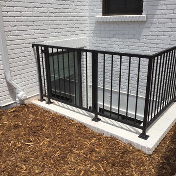 wrought iron and pre-fab steel fences