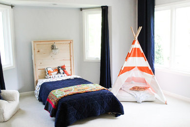 Example of a large transitional boy carpeted and beige floor kids' room design in Minneapolis with gray walls