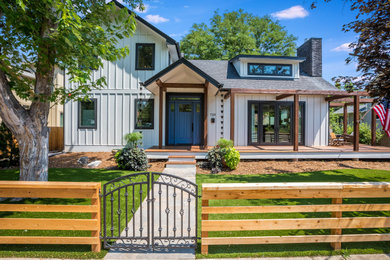 Mid-sized country white two-story wood and board and batten exterior home photo in Denver with a shingle roof and a gray roof