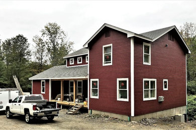Example of an arts and crafts exterior home design in Boston