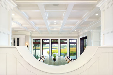 Foyer - coastal foyer idea in Charleston with white walls