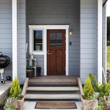 ブルーグレーのモダンログハウス