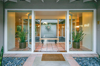 Entryway - 1950s entryway idea in Orange County