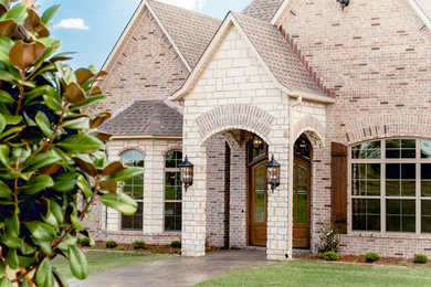 Example of a large classic home design design in Other