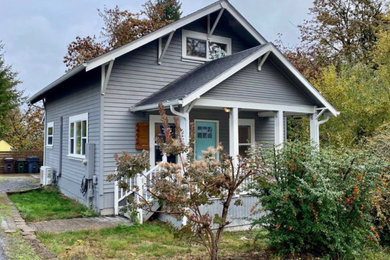 Example of a french country exterior home design in Portland
