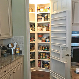 Small kitchen pantry pictures - Inspiration for a small u-shaped kitchen pantry remodel in Raleigh