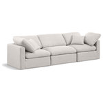Meridian Furniture - Indulge Upholstered Modular Sofa, Cream, 3-Piece: 1 Armless Chair, 2 Corner Chair, Down Stuffed Linen Textured Fabric - Experience ultimate comfort and style with our cream linen textured fabric Indulge Sofa. The luxurious linen texture of the fabric will elevate the aesthetic of any room. This sofa provides ample space for you to relax while its modular build offers the option of unlimited configurations. Whether you're looking to add a stylish element to your living room or a comfortable seating option to your bedroom, this sofa is the perfect choice.
