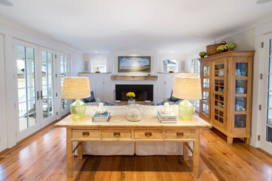 Beach style family room photo in New York