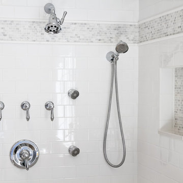 Subway Tile Shower with Multi-Head Fixtures and Mosaic Accent – Manchester-by-th
