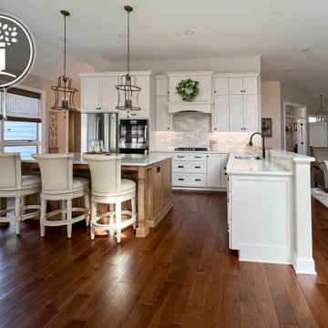 Bright & Timeless Kitchen Reorientation with Fireplace Refresh
