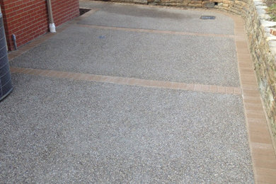 CUSTOM CONCRETE - EXPOSED AGGREGATE WITH INTEGRAL BRICK INLAY
