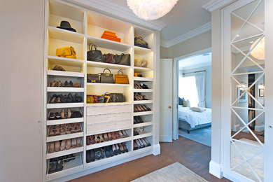Design ideas for a transitional storage and wardrobe in London.