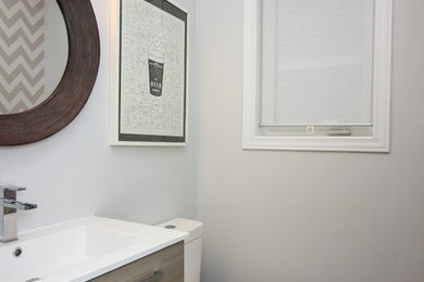 Example of a trendy powder room design in Ottawa