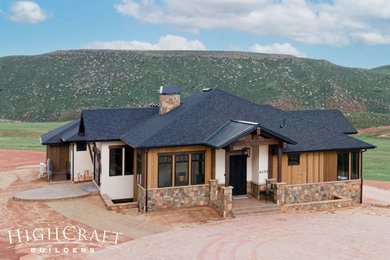 Rustic exterior home idea in Denver