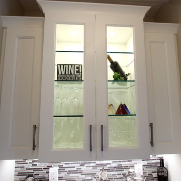 White Kitchen with Gray and Black Quartz Countertop and Bar Area ~ Streetsboro