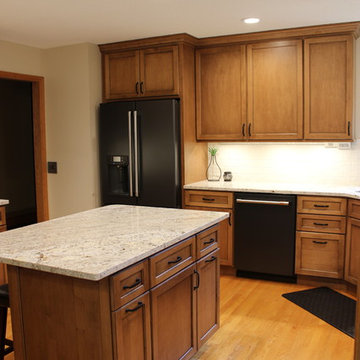 Maple Kitchen With Black and Gold Accents