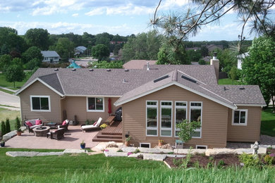 Patio - contemporary patio idea in Omaha