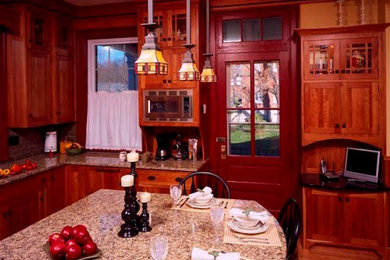 Mid-sized trendy u-shaped dark wood floor kitchen photo in Indianapolis with shaker cabinets, dark wood cabinets, granite countertops, an island, a drop-in sink, stainless steel appliances, red backsplash and brick backsplash