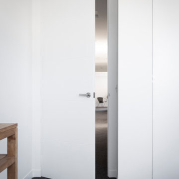 The EzyJamb Single Rebate (SRC) frames this door - aiding in the minimalist visi