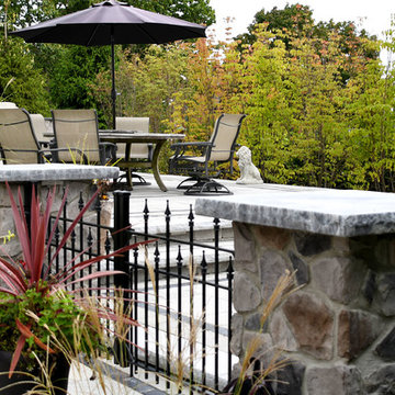 grand backyard entrance with pillars