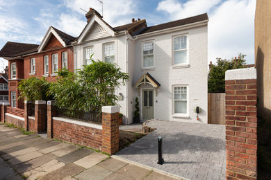 Inspiration for a small victorian two floor brick and front house exterior in Sussex.