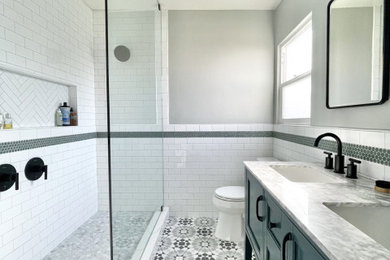 Inspiration for a small farmhouse 3/4 white tile and subway tile porcelain tile, multicolored floor and double-sink bathroom remodel in San Diego with shaker cabinets, green cabinets, a two-piece toilet, green walls, an undermount sink, marble countertops, white countertops, a niche and a freestanding vanity