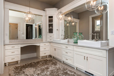 Design ideas for a large contemporary master bathroom in Salt Lake City with shaker cabinets, white cabinets, a freestanding tub, an alcove shower, beige walls, porcelain floors, a vessel sink, quartzite benchtops, a two-piece toilet, gray tile and stone slab.