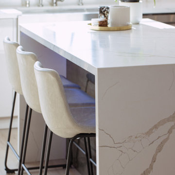 Hushed Glossy Kitchen With Island