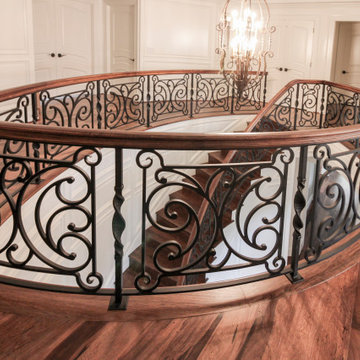 Project #74 | Circular Staircase with Hand-Forged Metal Panels