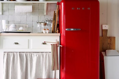 Example of a cottage kitchen design in New York