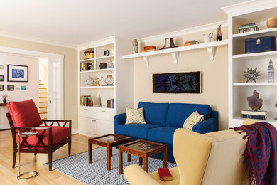 Living room - mid-sized eclectic formal and enclosed light wood floor and beige floor living room idea in San Francisco with beige walls, no fireplace and no tv