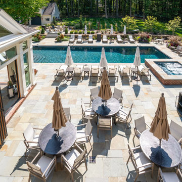 NW Wood 540 folding glass cabana open to the pool and patio