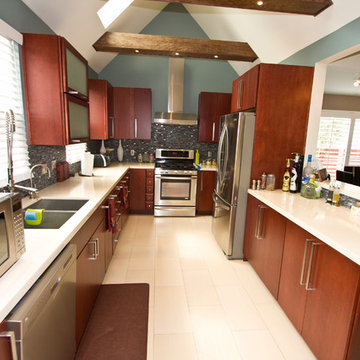 Galley Kitchen Run With Stainless Range Hood