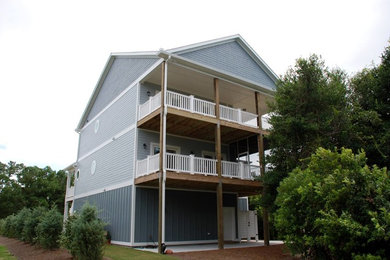 Example of a beach style exterior home design in Other