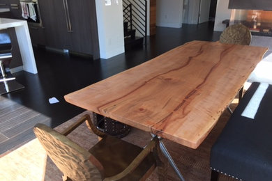 Mid-sized trendy concrete floor and gray floor enclosed dining room photo in San Francisco with white walls