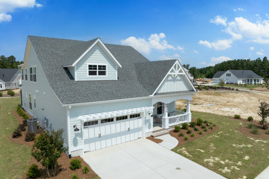 Beach style home design photo in Other