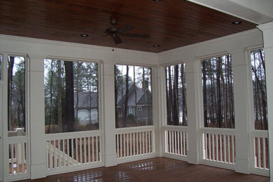 This is an example of a traditional porch design in Atlanta.