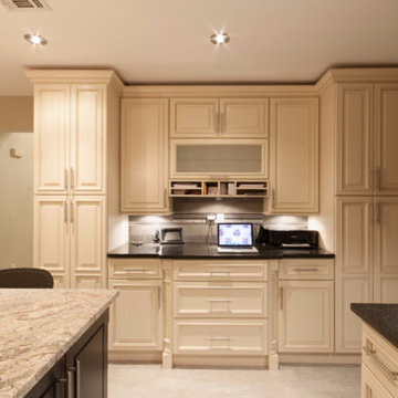 Fabuwood ivory wellington kitchen w/ chocolate maple island by Luxcraft Cabinets