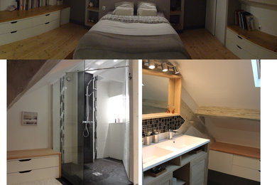 Foto på ett stort funkis badrum med dusch, med luckor med profilerade fronter, vita skåp, en kantlös dusch, svart och vit kakel, keramikplattor, klinkergolv i keramik, ett integrerad handfat, svart golv och med dusch som är öppen