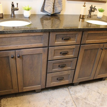 Moline, IL Bath Remodel With Gray Stained Cherry Vanity and Pebble Tiled Shower