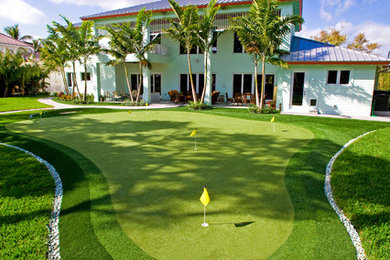 This is an example of a large transitional landscaping in Miami.