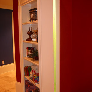 Classic basement in Atlanta with red walls, porcelain flooring and beige floors.