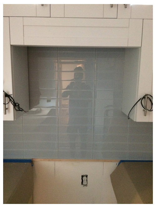 Why did they install the backspash behind a microwave?