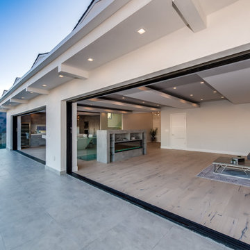 Covered Terrace with Pocketing Glass Wall Open to the Great Room
