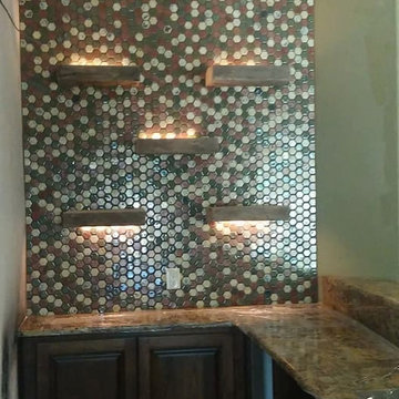 Custom Illuminated Floating Shelves in Vaulted Tile Alcove