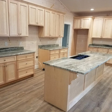 Fantasy Brown Dolomite + Light Wood Cabinets