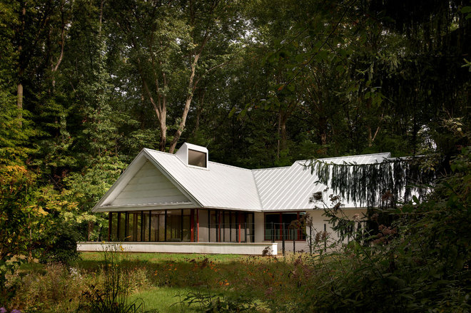 Industrial Exterior by Searl Lamaster Howe Architects