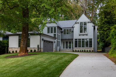 Example of a transitional exterior home design in Raleigh