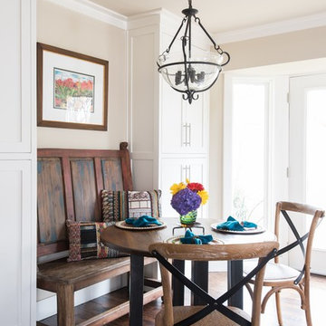 Built in Breakfast Nook with flanking pantry storage and custom bench