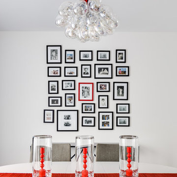 Eclectic White, Gray + Red Modern Dining Room with Blown Glass Light Pendant